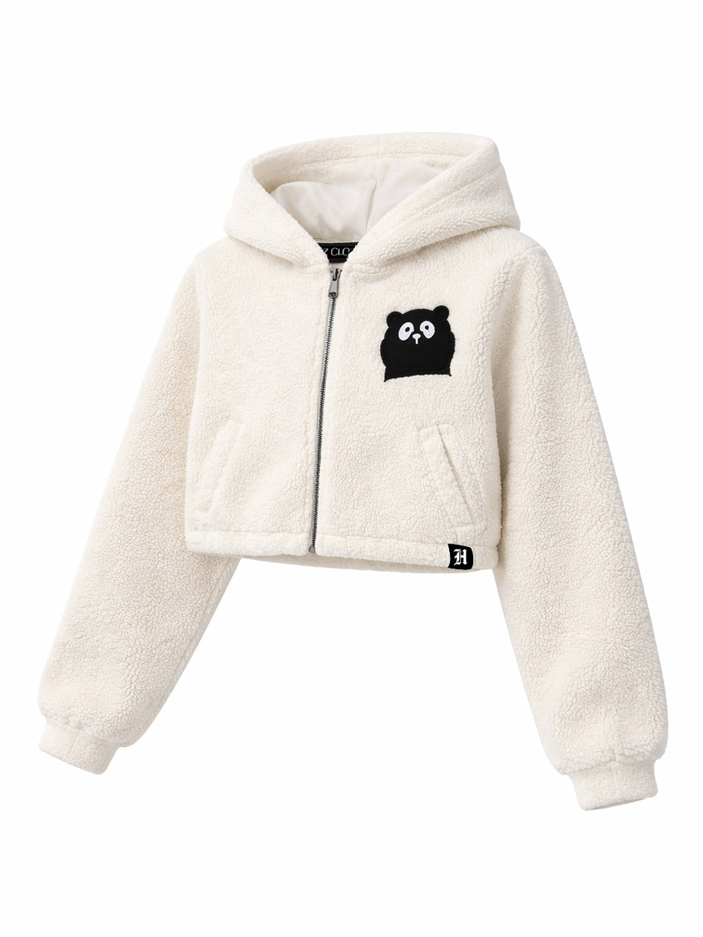 White fleece jacket with a black bear emblem on a white background